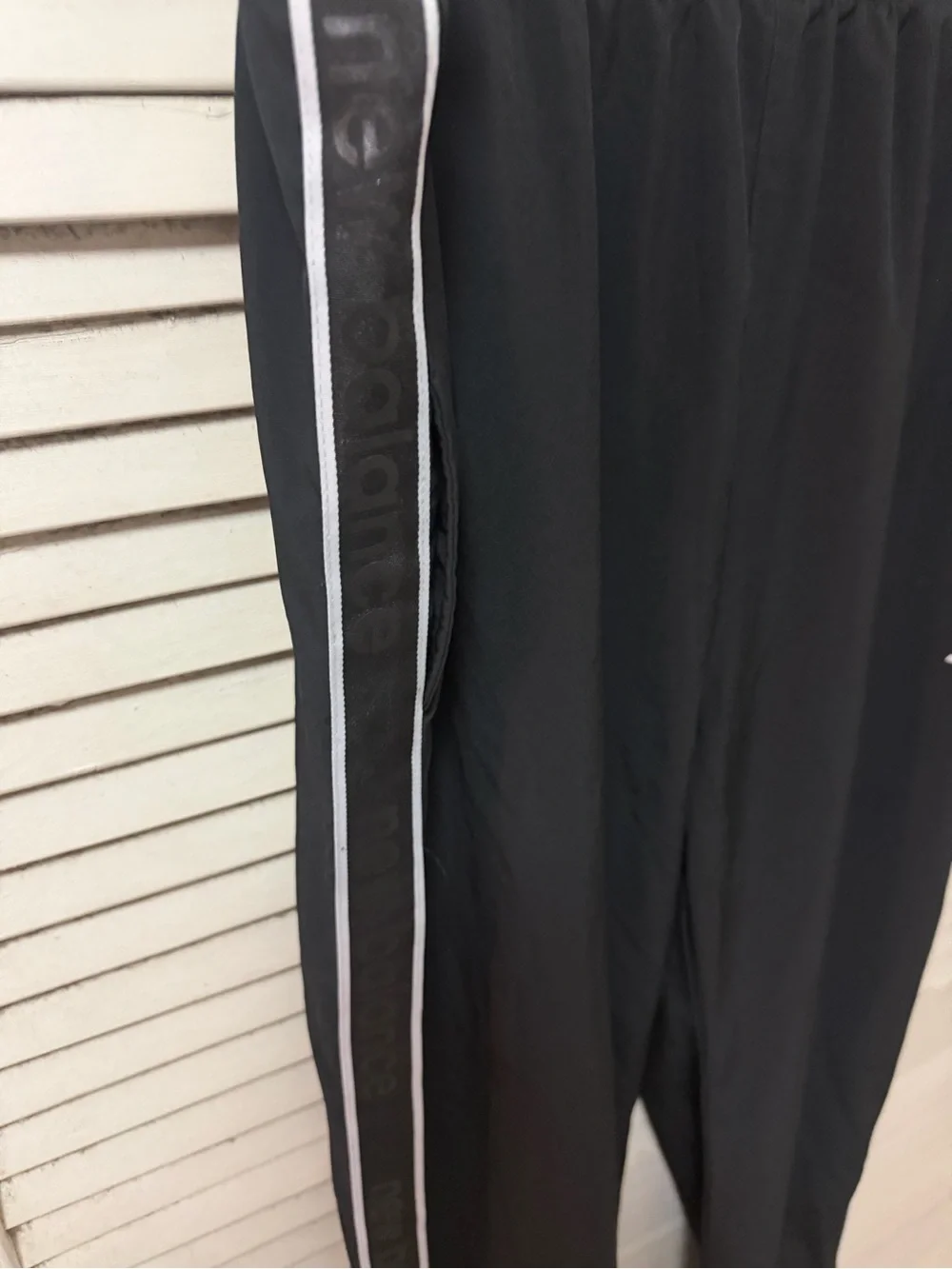 New Balance mens Black Athletic Track Pants